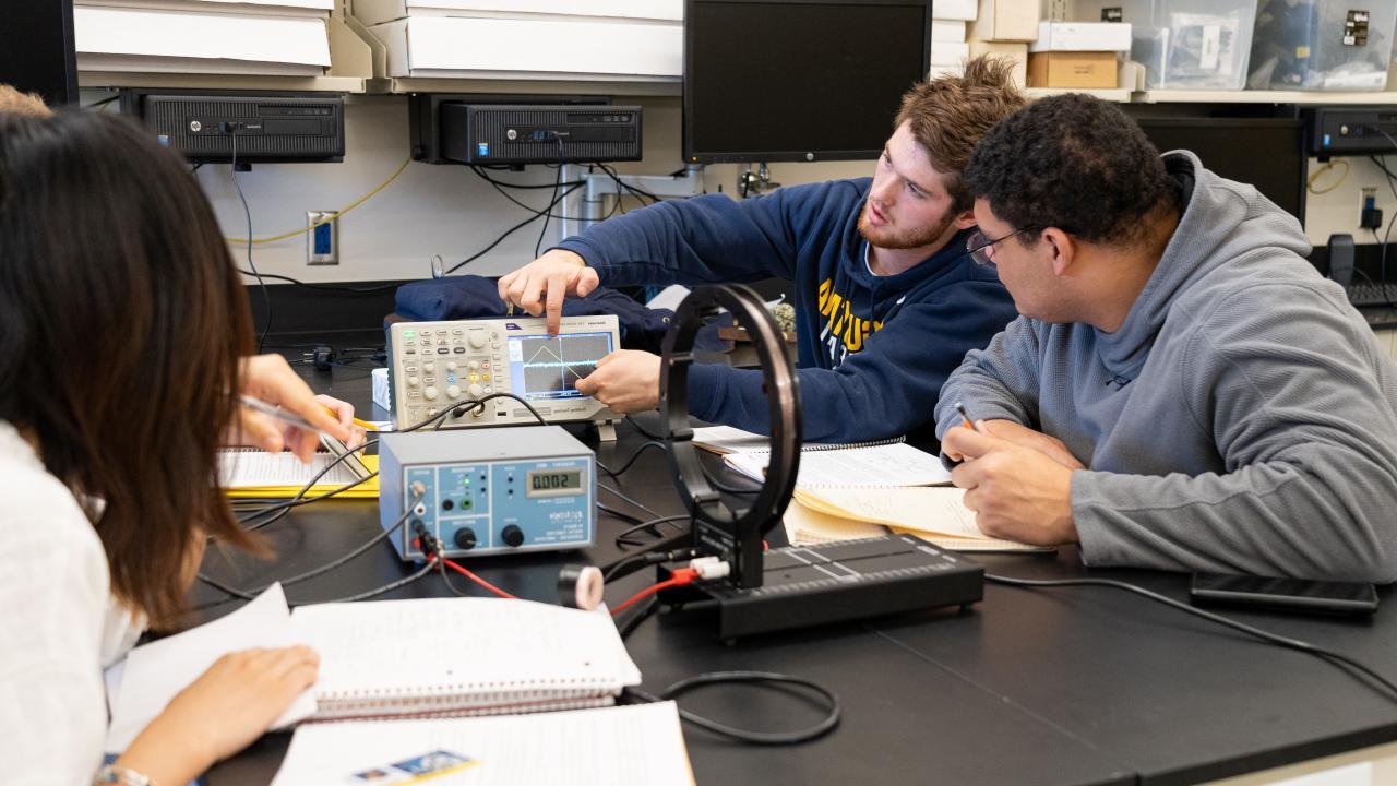 students in physics lab